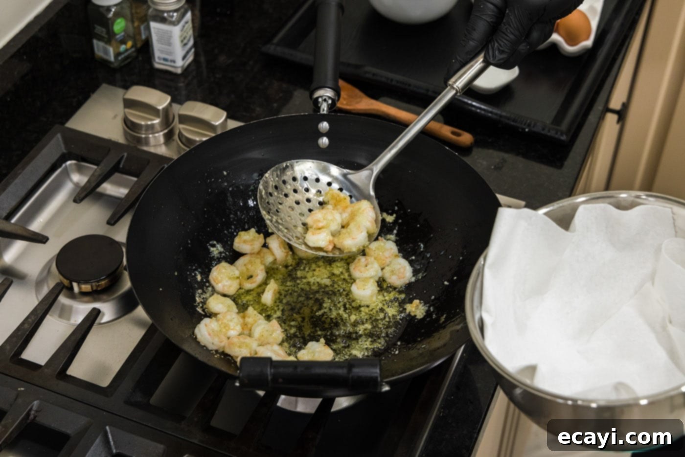 Golden Shrimp Fried Rice 7 removing cooked shrimp from oil in a wok