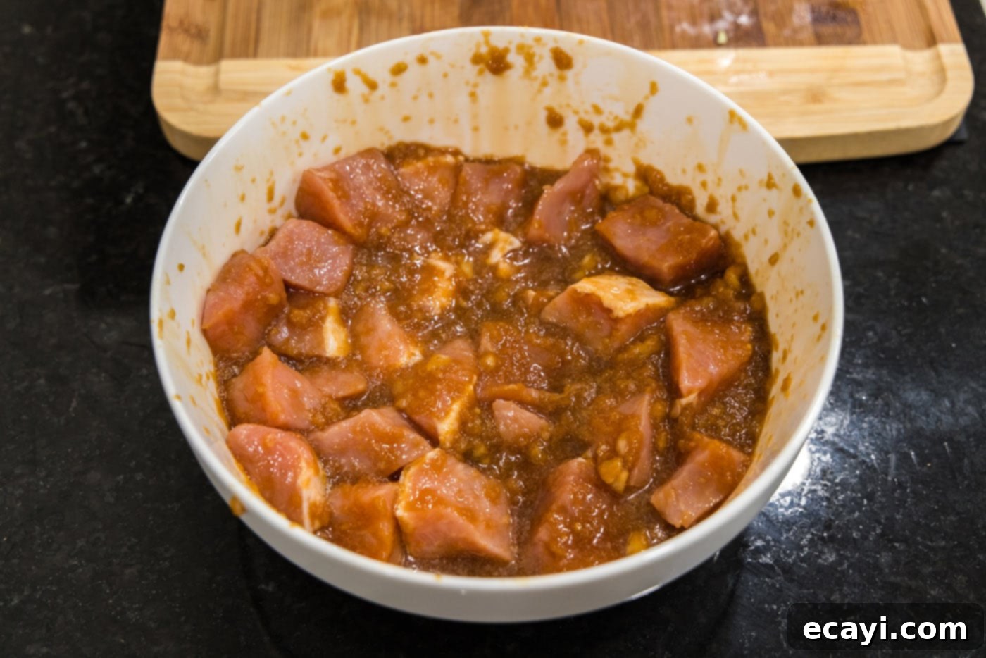 Tangy Glazed Pork Delight 5 marinating pork for stir fry