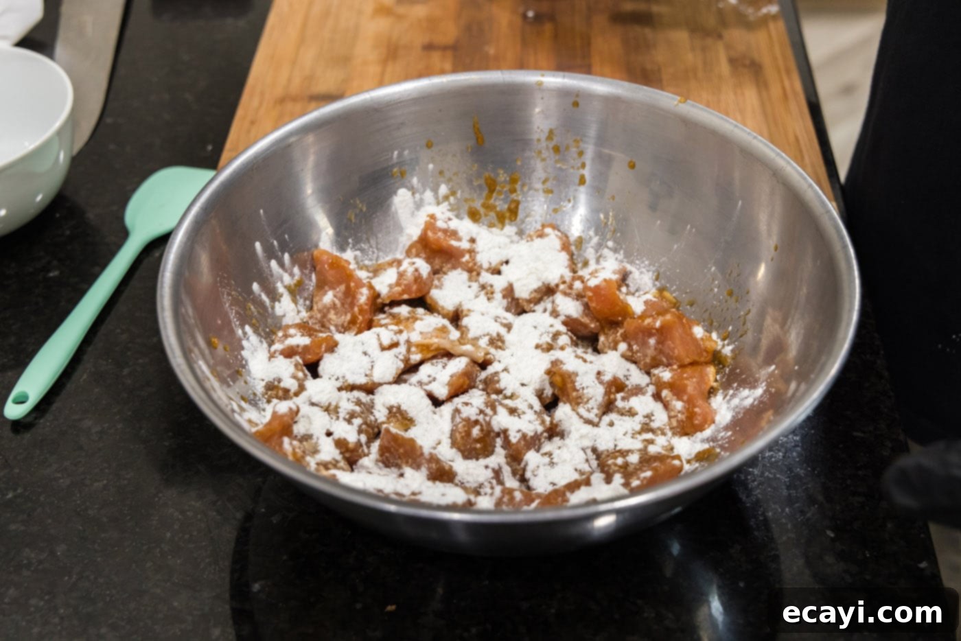 Tangy Glazed Pork Delight 8 pork cubes with flour sprinkled on top