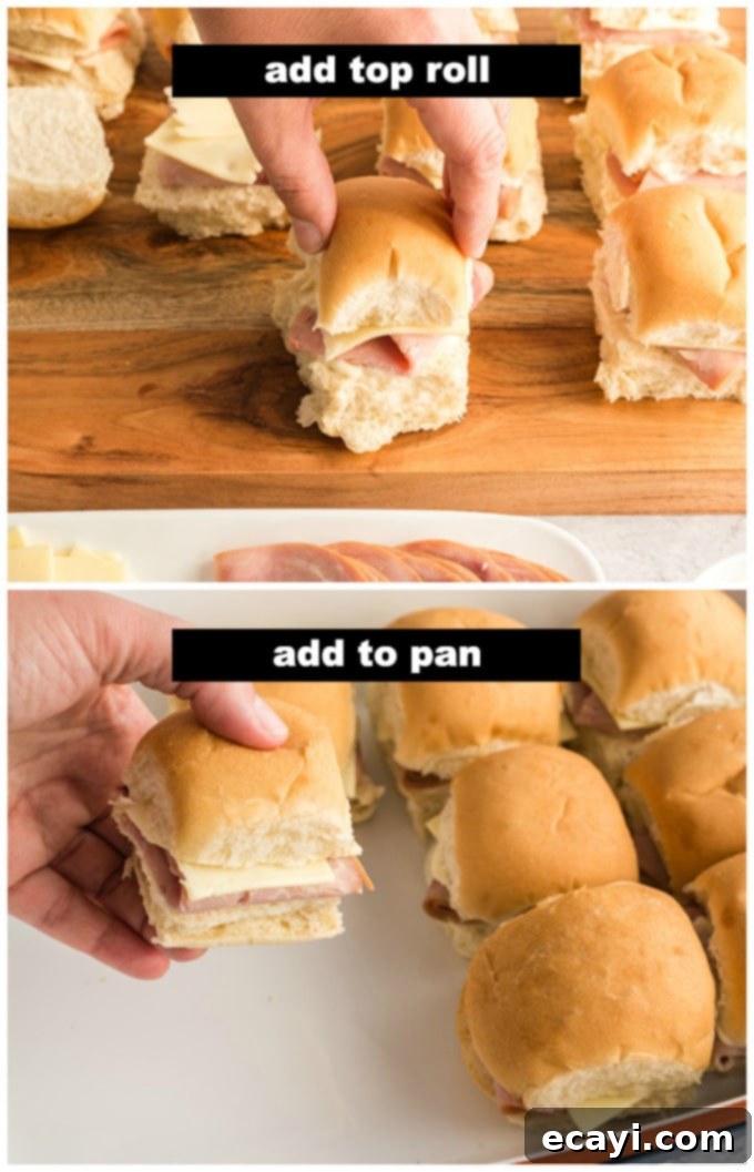 Ultimate Ham and Cheese Sliders 4 Arranging ham and cheese sliders in a baking dish.