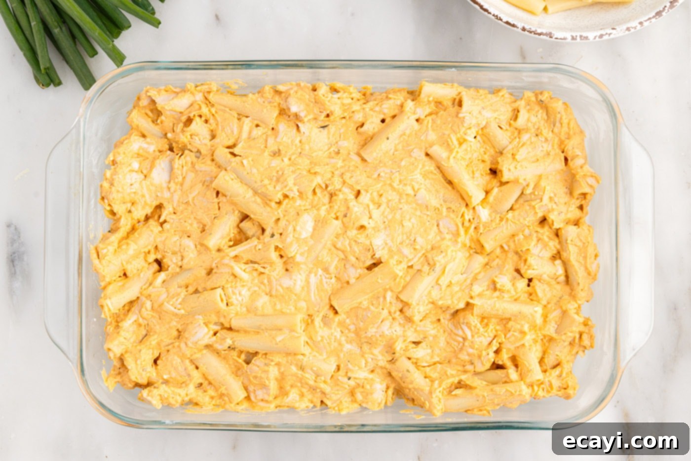 Fiery Chicken Comfort Bake 9 buffalo chicken pasta casserole in a dish