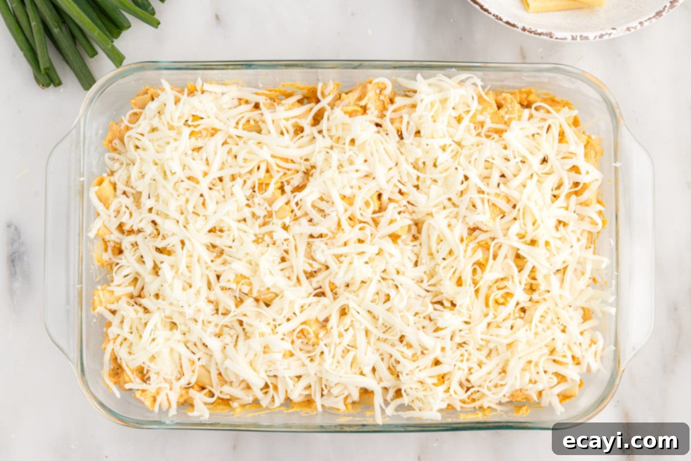 Fiery Chicken Comfort Bake 10 mozzarella cheese on top of buffalo chicken casserole