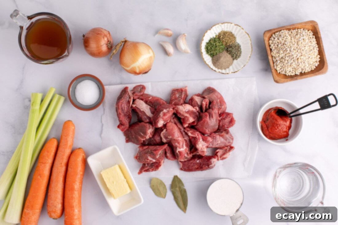 Wholesome Beef and Barley Comfort 4 A collection of fresh ingredients laid out on a wooden board, including beef stew meat, carrots, celery, onions, garlic, and pearl barley, ready for making beef barley soup.