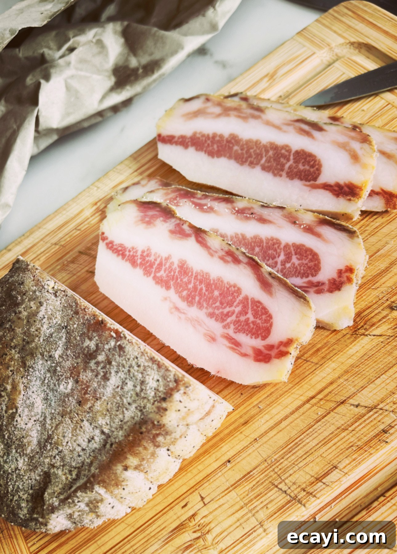 Amatriciana Style Bucatini 3 Guanciale is a cured pork product used to make Bucatini All'Amatriciana // FoodNouveau.com