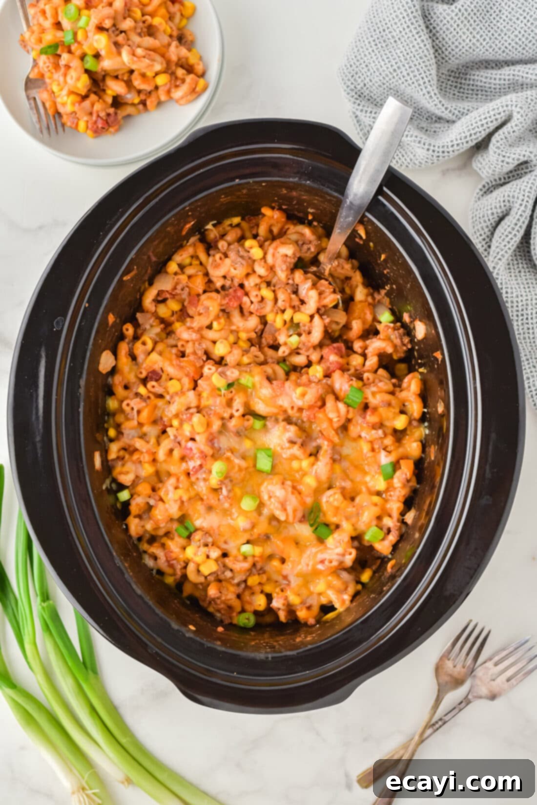 Unlocking Your Slow Cooker 3 An overhead shot of a bubbling Crockpot Ground Beef Casserole, richly textured and inviting, demonstrating the delicious and convenient meals a slow cooker can create.