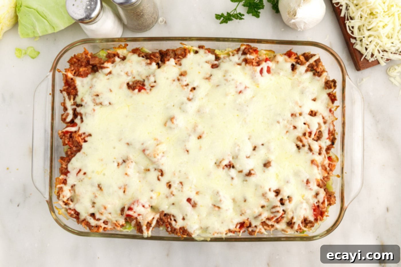 Hearty Cabbage Roll Bake 14 overhead shot of a baked cabbage roll casserole, garnished with parsley