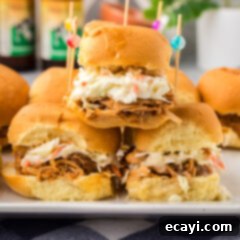 Mini BBQ Chicken Sandwiches 12 Stack of BBQ Chicken Sliders, showing multiple assembled sliders ready to eat.