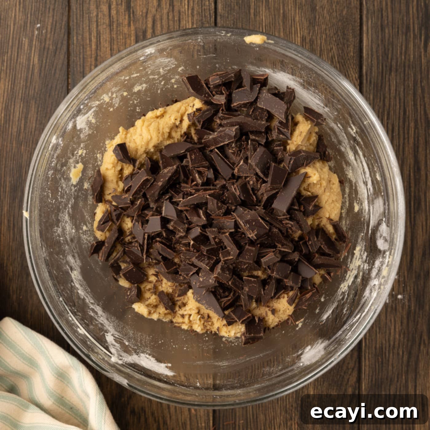 Molten Skillet Chocolate Caramel Cookie 12 chopped chocolate added to bowl of cookie dough