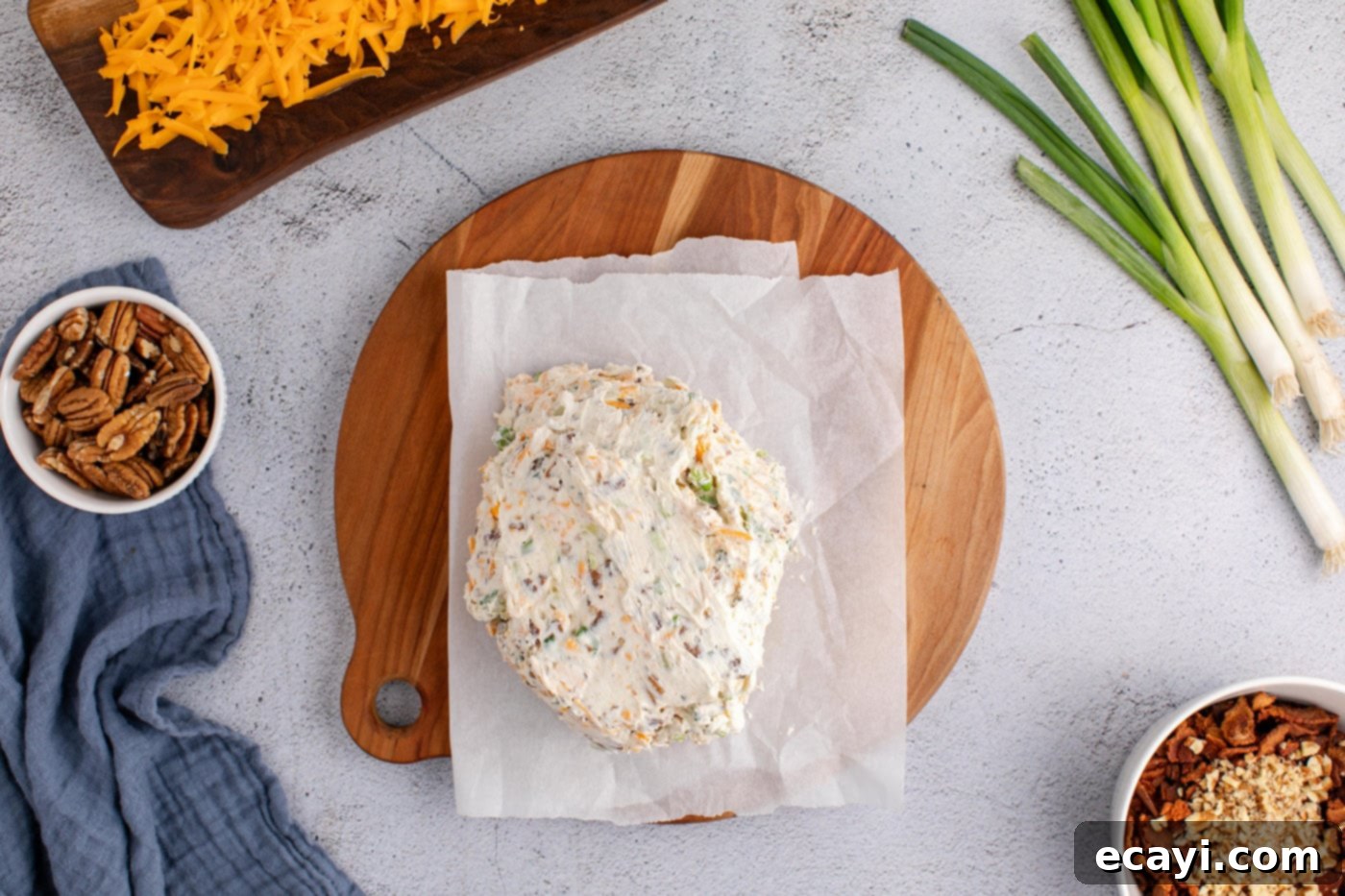 Touchdown Cheese Ball 11 cream cheese cheese ball on parchment paper