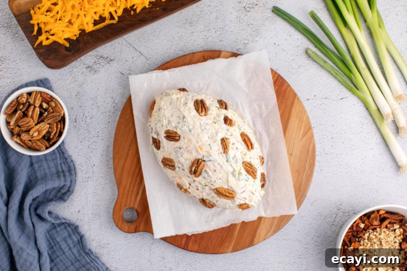 Touchdown Cheese Ball 13 whole pecans added to football cheese ball