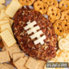 Touchdown Cheese Ball 17 Close up photo of a Football Cheese Ball with crackers around it