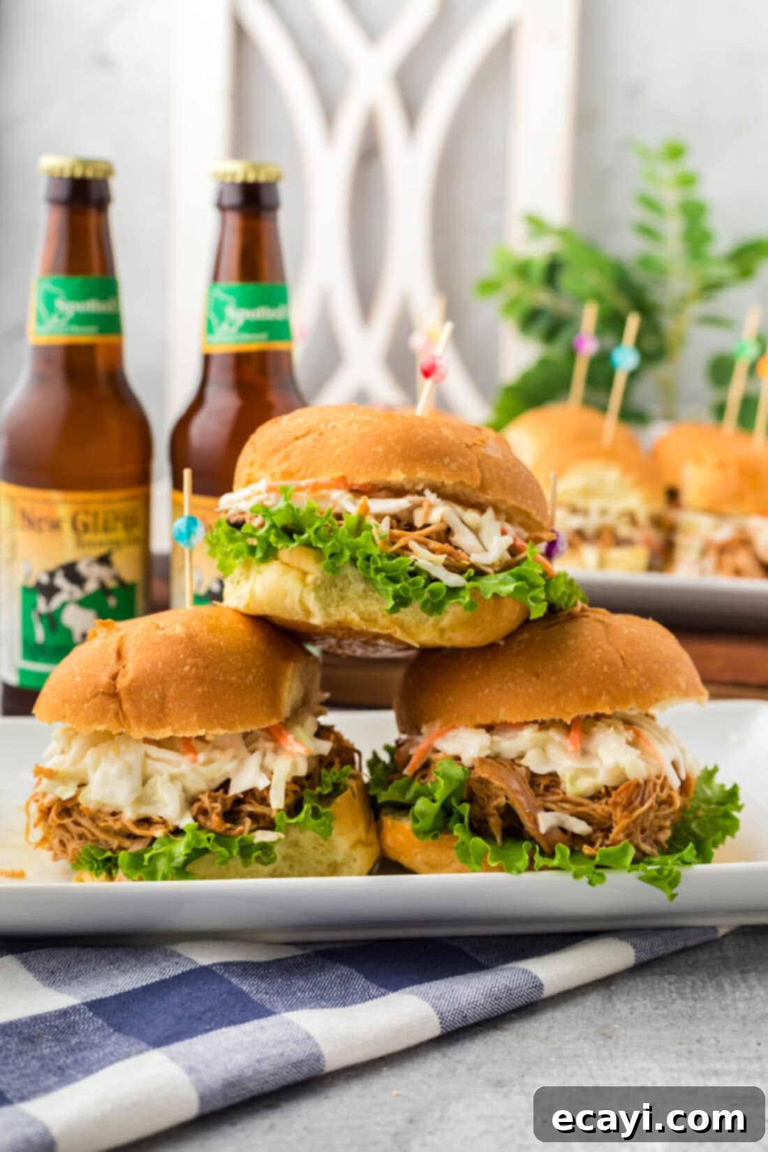Smoky BBQ Chicken Sandwich 11 A stack of three perfectly plated BBQ Chicken Sandwiches with coleslaw, ready to be served.