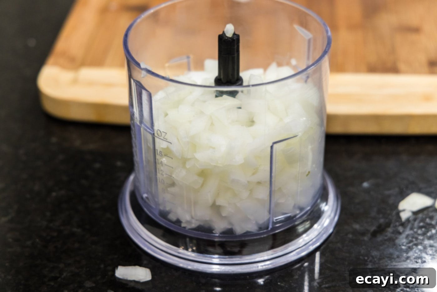 Smoky BBQ Chicken Sandwich 5 Coarsely chopped onion pieces in a food processor bowl before mincing.