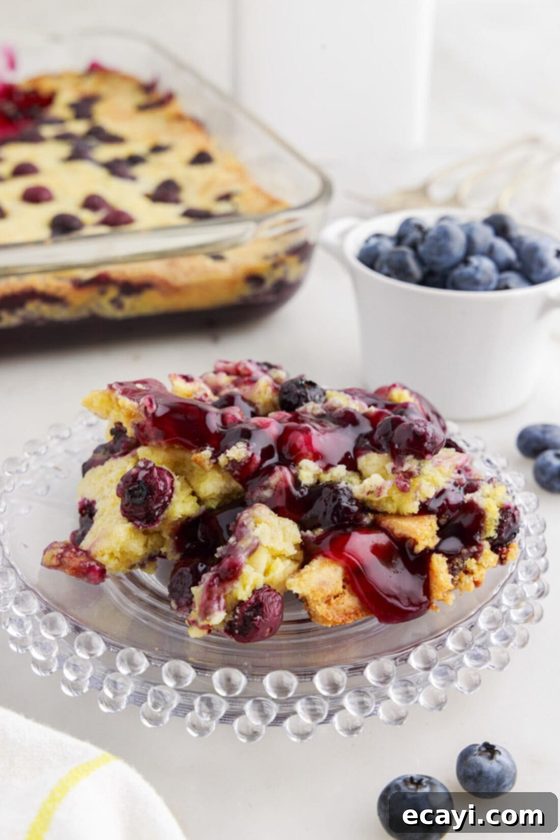 Effortless Blueberry Delight 9 Blueberry Dump Cake on a plate