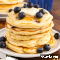 Bursting Blueberry Breakfast Flapjacks 13 Stack of Blueberry Pancakes on a plate