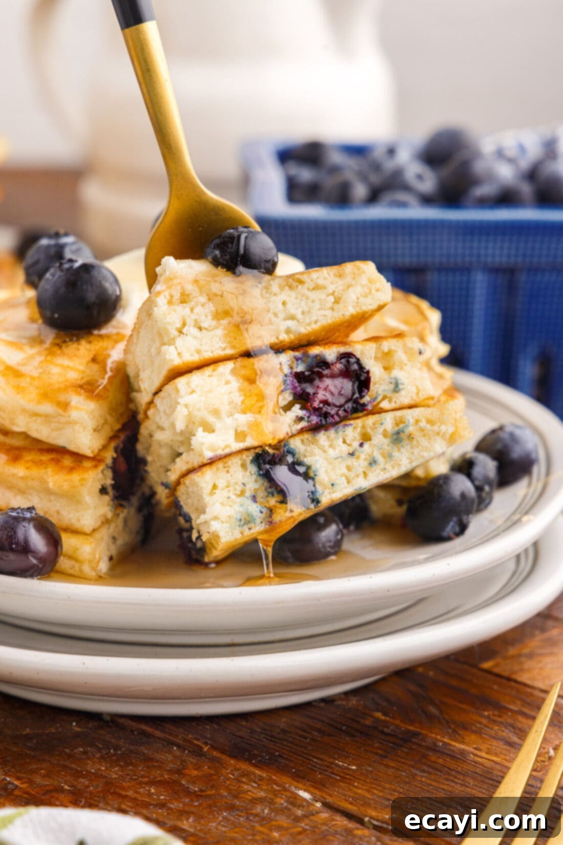 Bursting Blueberry Breakfast Flapjacks 3 Pieces of Blueberry Pancakes on a fork