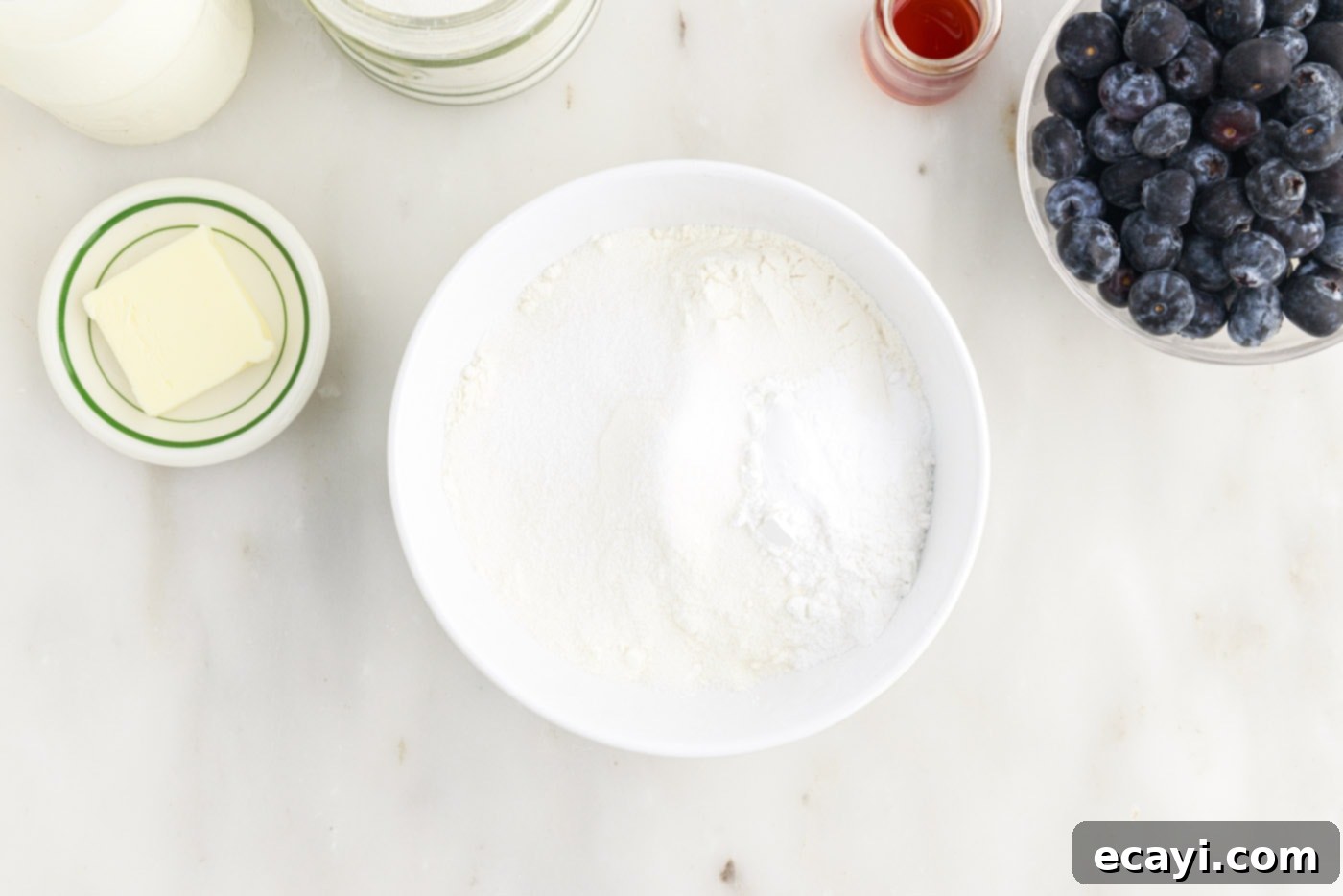 Bursting Blueberry Breakfast Flapjacks 5 pancake dry ingredients mixed in a bowl