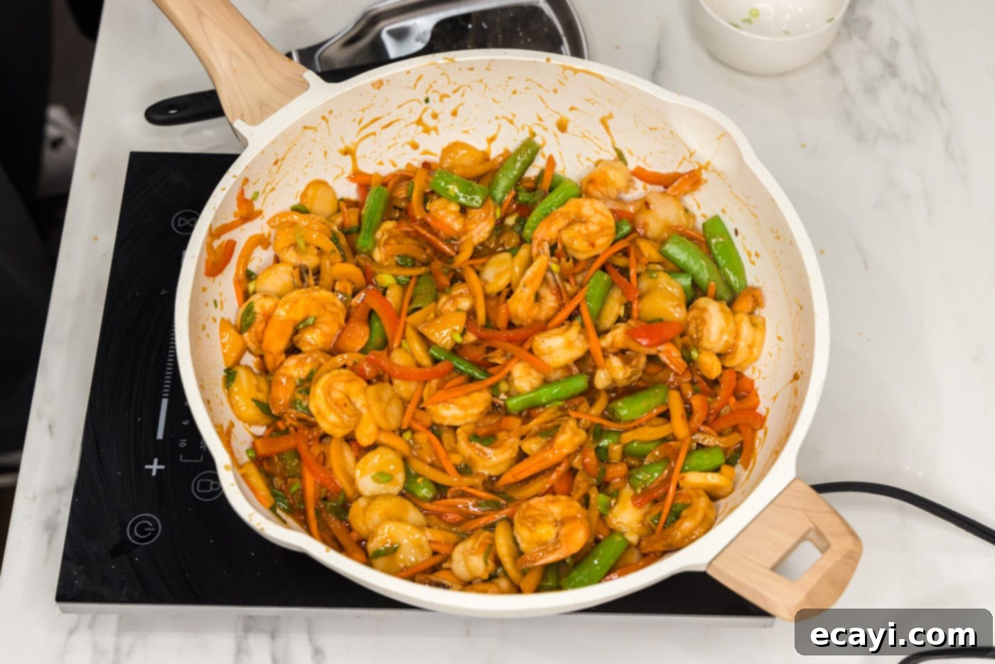 Quickfire Shrimp Stir-Fry 12 easy shrimp stir fry cooked and ready in a skillet, showcasing vibrant colors