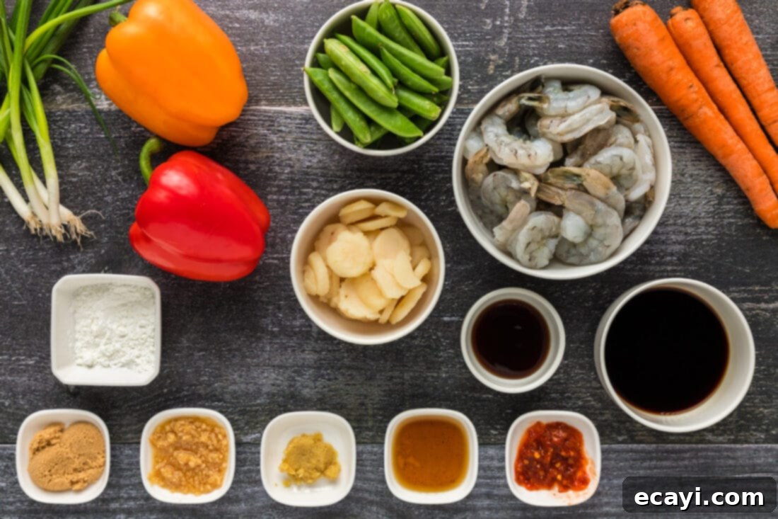 Quickfire Shrimp Stir-Fry 4 Ingredients for Easy Shrimp Stir Fry: raw shrimp, bell peppers, carrots, snap peas, garlic, ginger, and various sauces