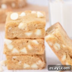 Chewy Blondie Bars 14 Three Blondies stacked with one resting on the side