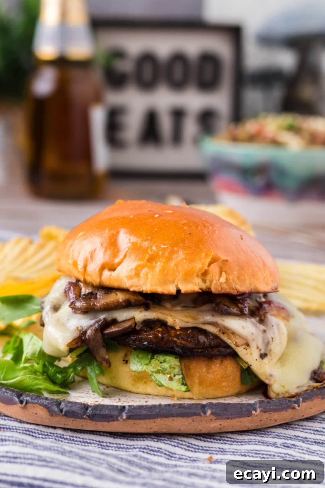 Mushroom Burger 16 Mushroom Burger on a plate with potato chips