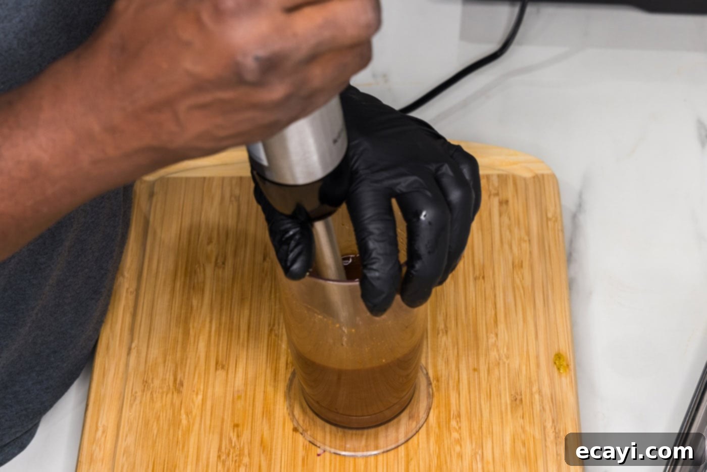 Mushroom Burger 6 blitzing mushroom marinade with an immersion blender
