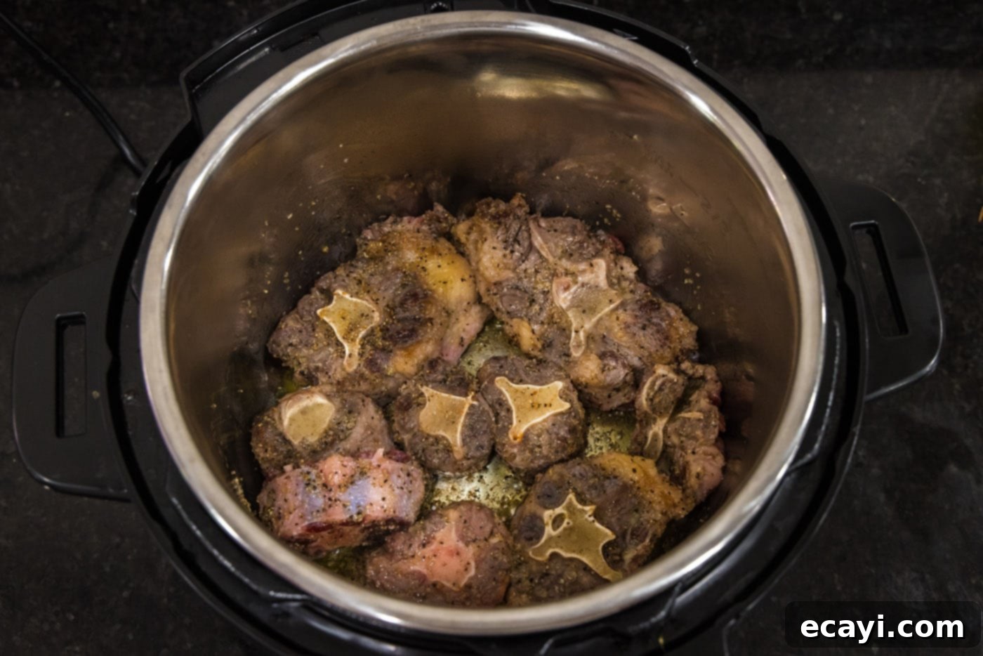 Instant Pot Fall-Off-The-Bone Oxtail 6 browned oxtail in instant pot