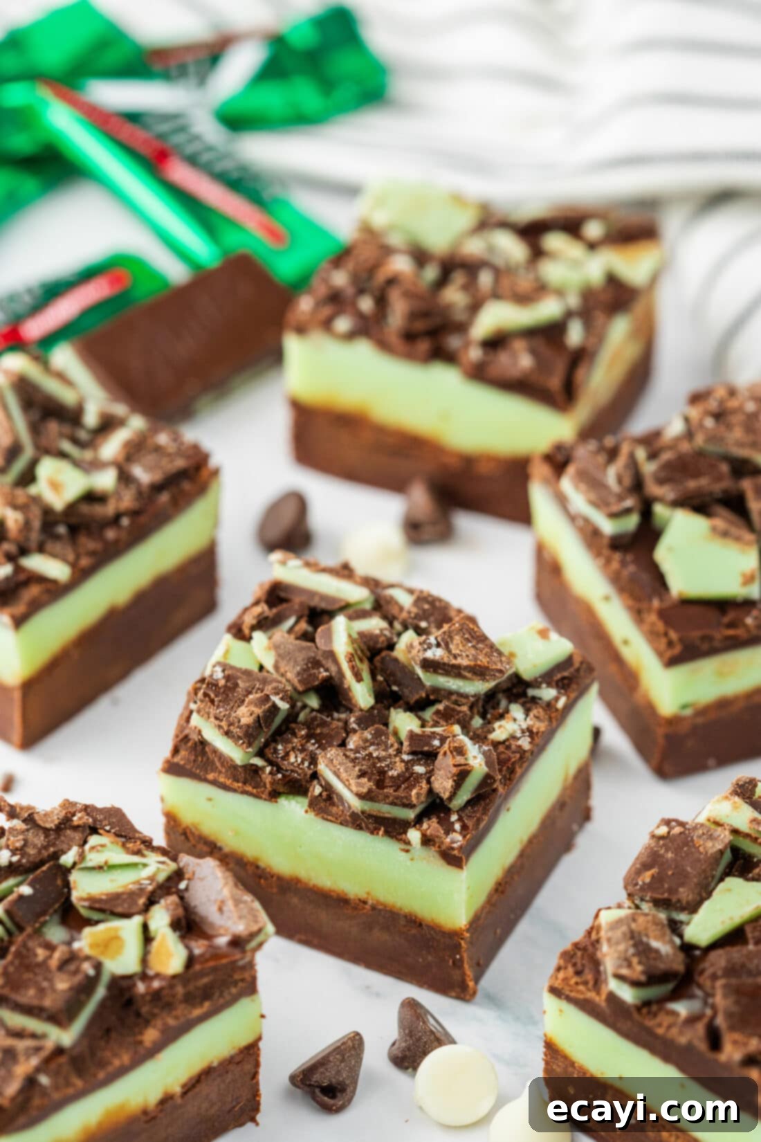 Irresistible Andes Mint Fudge 2 Andes Mint Fudge on a table with mints in the background