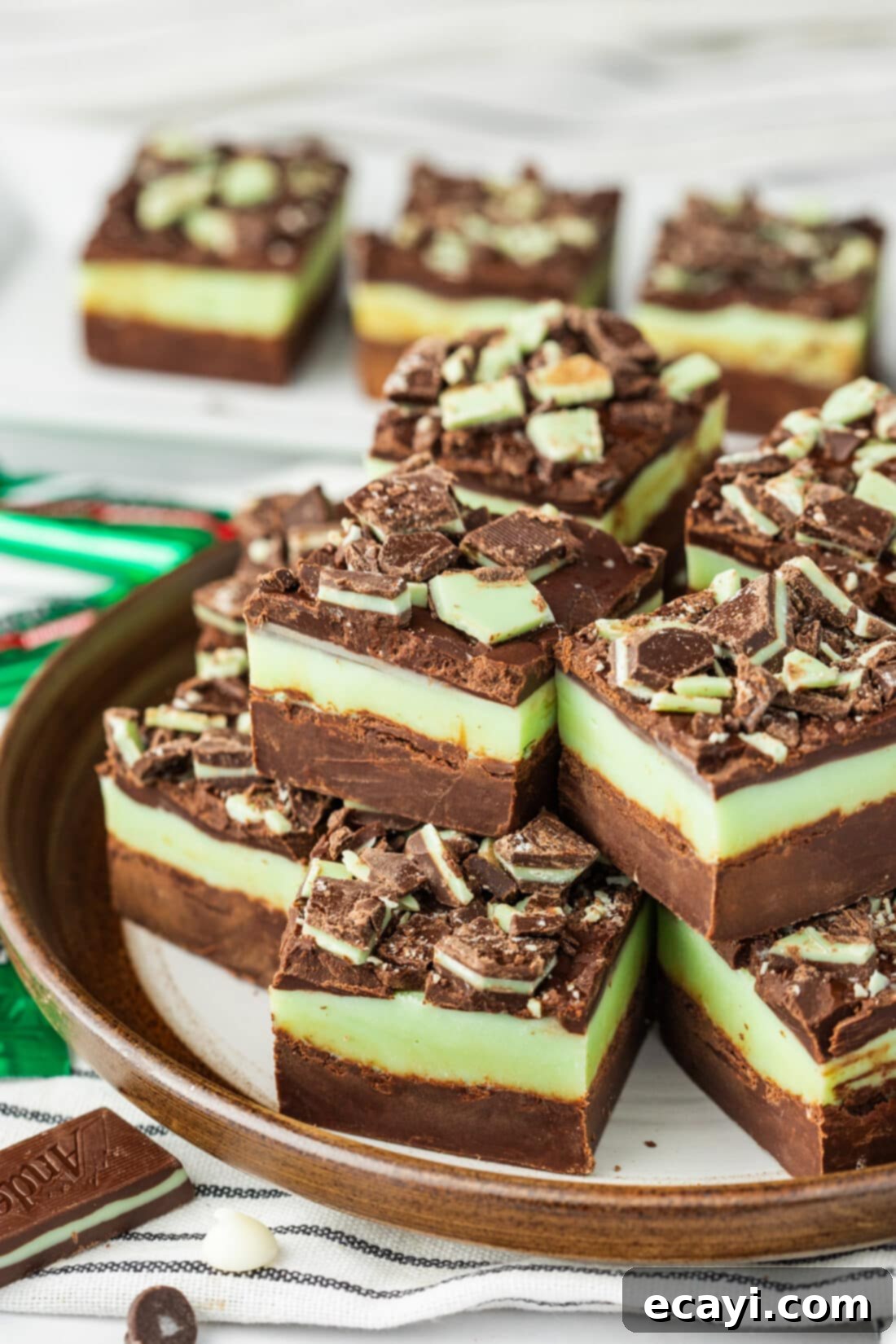 Irresistible Andes Mint Fudge 13 Andes Mint Fudge stacked on a plate