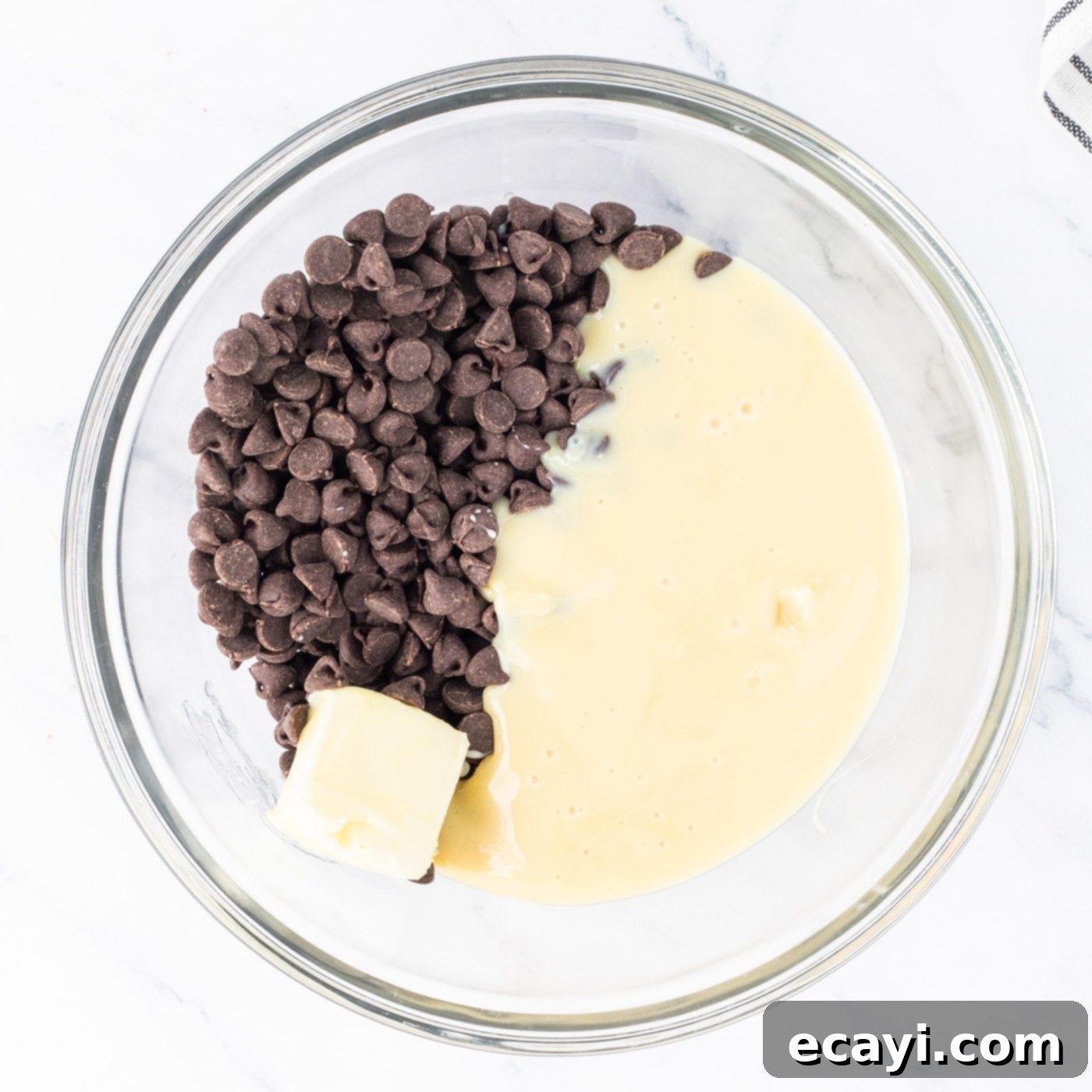 Irresistible Andes Mint Fudge 5 semi sweet chocolate chips in a bowl with butter and sweetened condensed milk