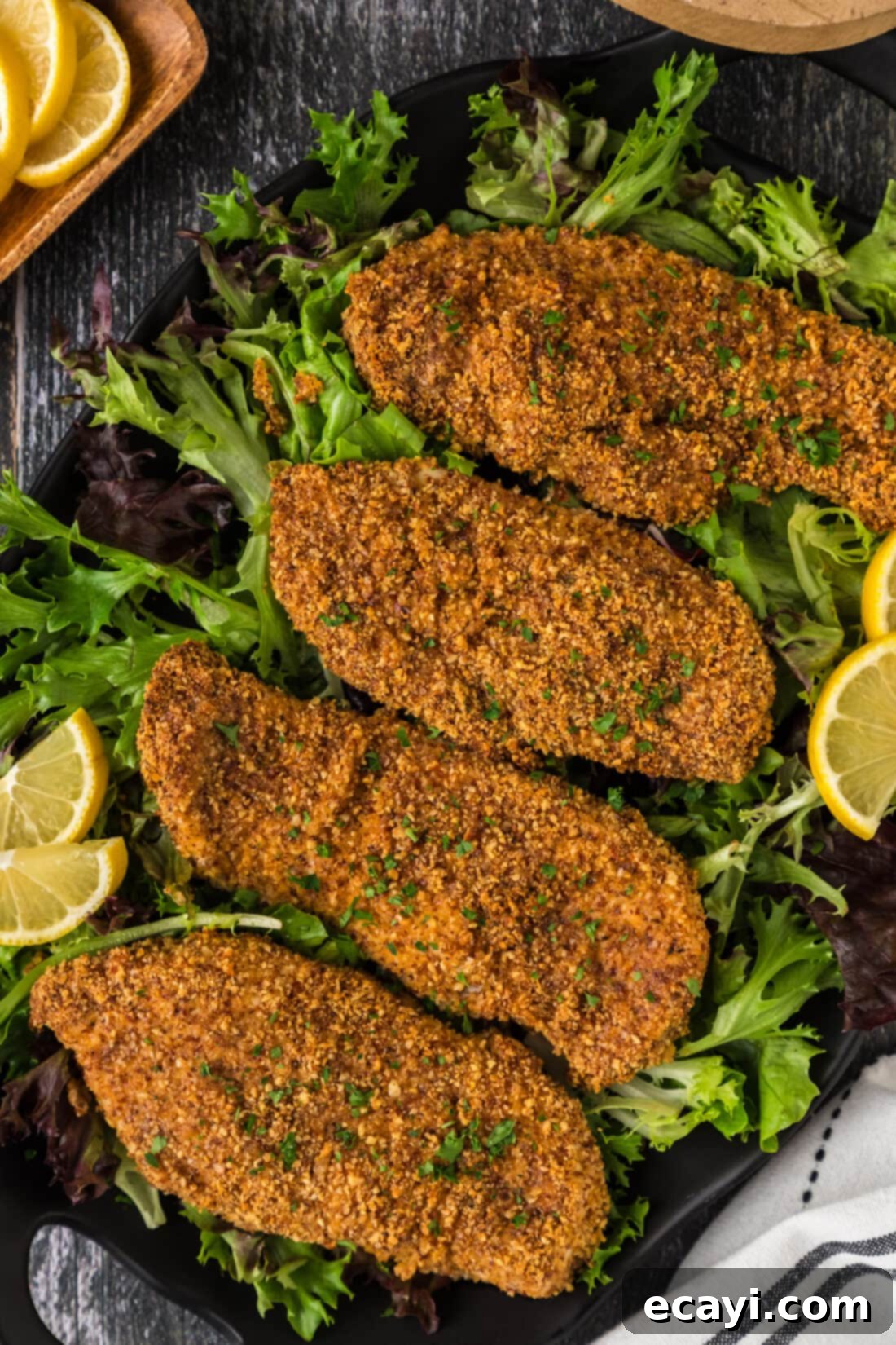 Golden Almond Chicken 3 Four Almond Crusted Chicken breasts on a platter