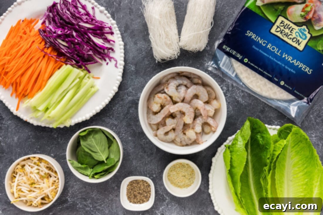 Hand-Rolled Shrimp Delights 4 A colorful array of ingredients for Shrimp Spring Rolls laid out on a cutting board, including fresh vegetables, cooked shrimp, and rice paper wrappers.
