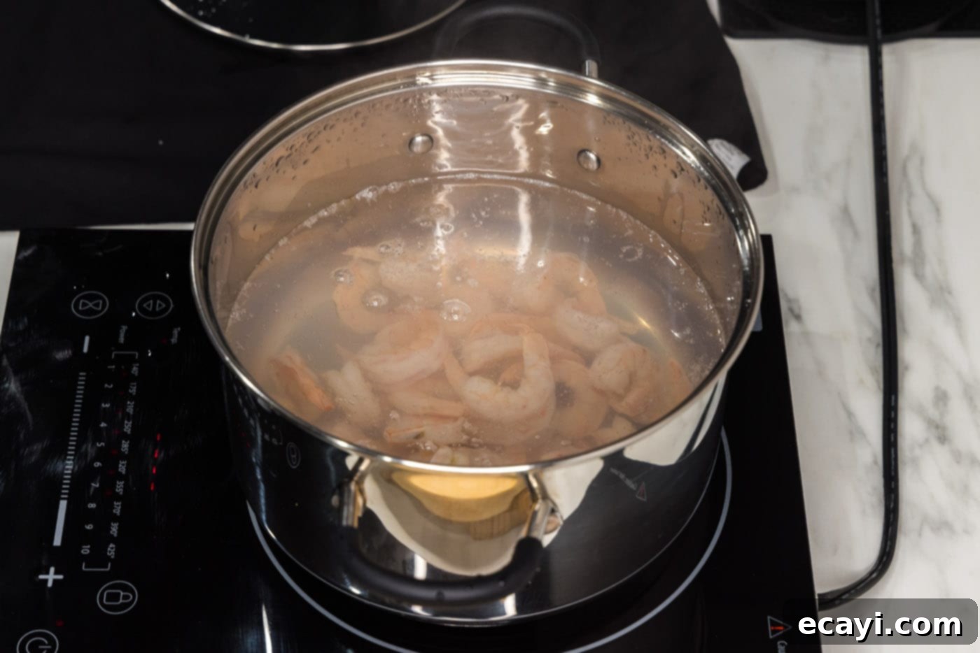Hand-Rolled Shrimp Delights 5 boiling shrimp in a stock pot until pink and tender
