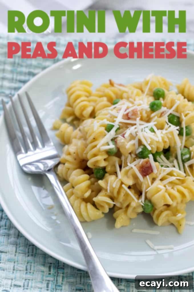 Bacon and peas combined with sharp cheddar make a delicious meal in this easy Rotini Peas and Cheese. It's mac and cheese for grown ups! #macandcheese #macaroniandcheese #rotinipasta #rotinirecipes #pastarecipes #pastaandcheese #cheddarcheese #peas #bacon #sidedish #stovetop  rotini peas and cheese