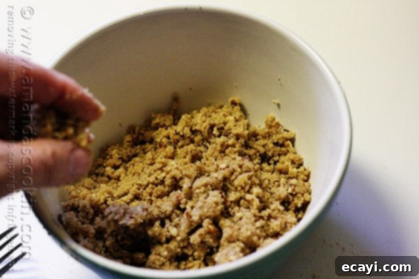 Cozy Pumpkin Mini Cakes with Cinnamon Streusel 14 A photo of a bowl of streusel topping.