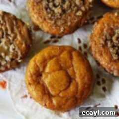 Cozy Pumpkin Mini Cakes with Cinnamon Streusel 18 A close up overhead photo of pumpkin mini cakes with cinnamon streusel topping.