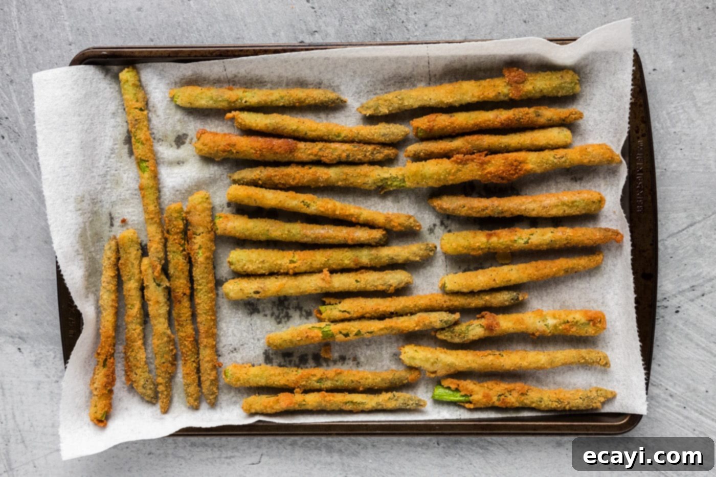 Golden Asparagus Crunch 12 fried asparagus draining on paper towels