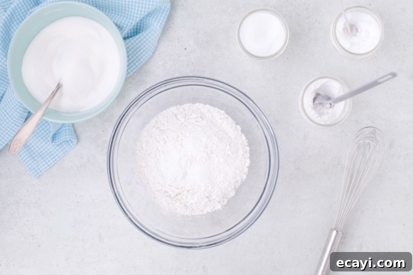 Vanilla Cupcakes 5 Whisked cake flour, sugar, baking powder, baking soda, and salt in a bowl