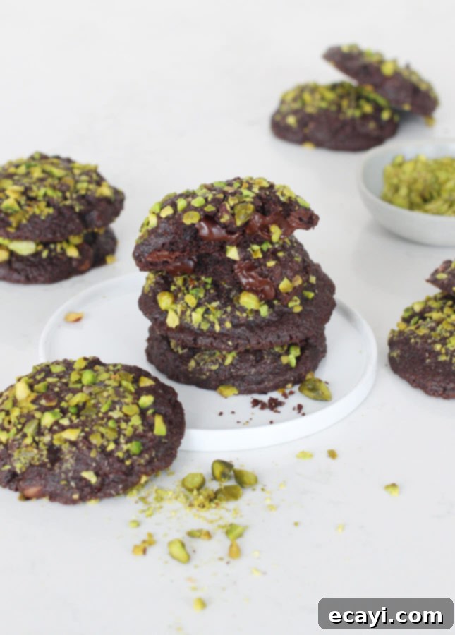 Decadent Triple Chocolate Pistachio Delights 2 Triple Chocolate and Pistachio Cookies // FoodNouveau.com