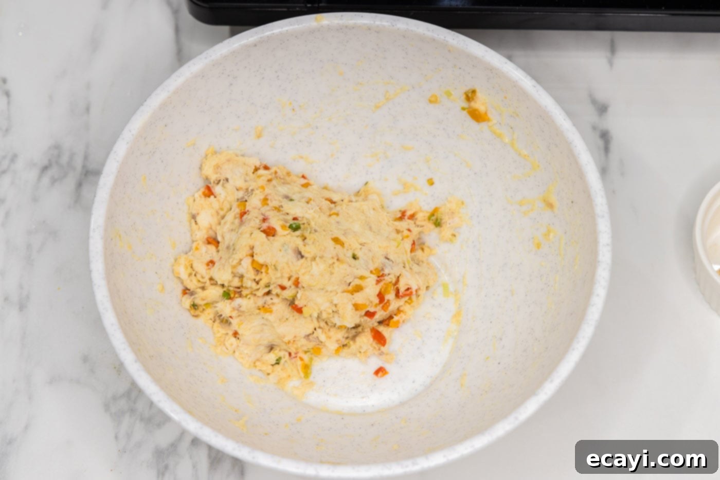 Crispy Fish Sandwich 9 fully mixed fish patty mixture in a bowl, ready for forming