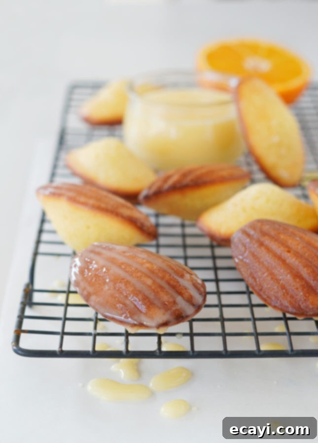 Your Step-by-Step Guide to Classic Madeleines 11 Orange glazed classic madeleines // FoodNouveau.com