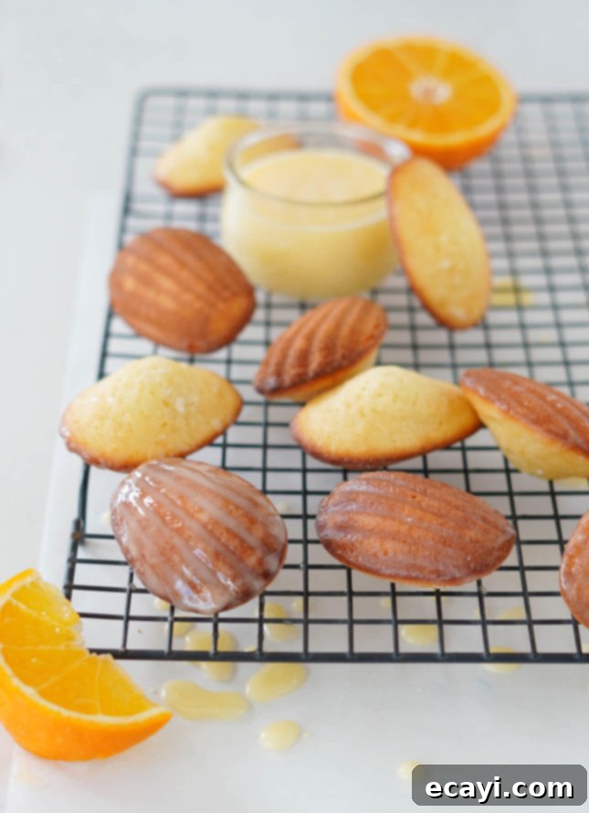 Your Step-by-Step Guide to Classic Madeleines 10 A simple orange glaze on classic madeleines // FoodNouveau.com