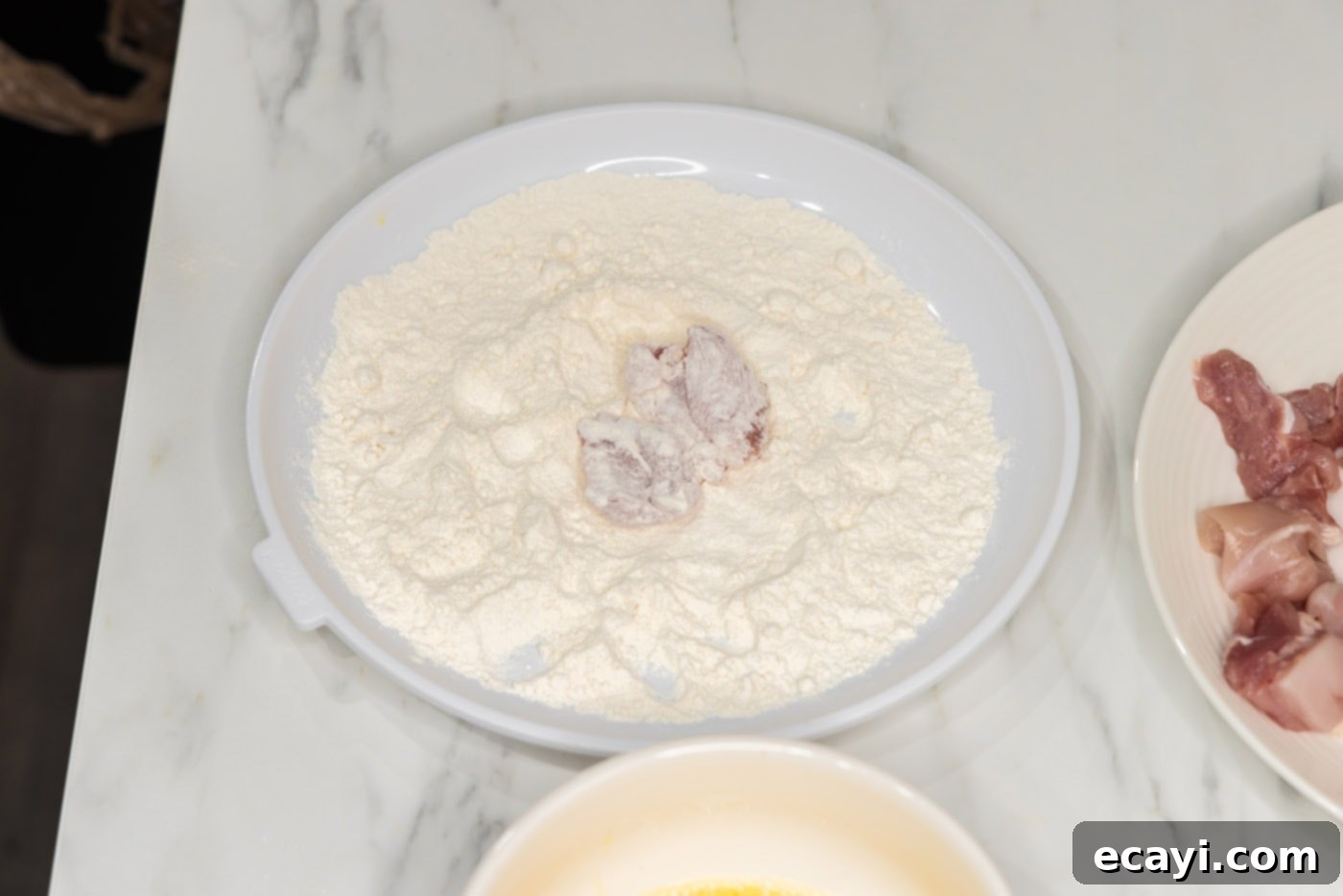 Creamy Peanut Butter Chicken 5 dredged chicken pieces in flour, coated evenly