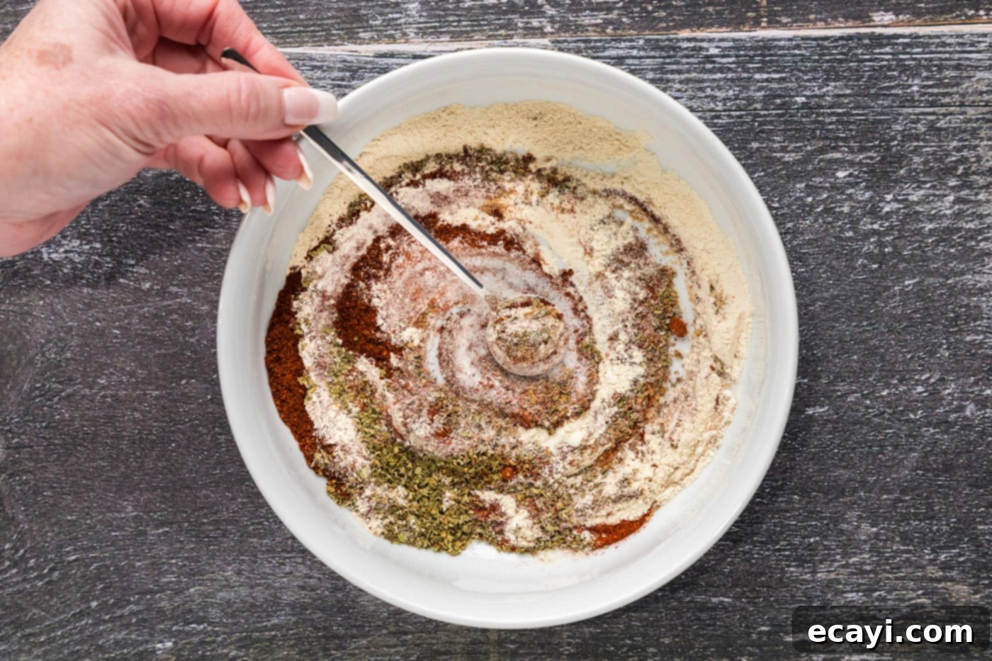 Fiesta Spice Blend 6 mixing mexican seasoning in a bowl