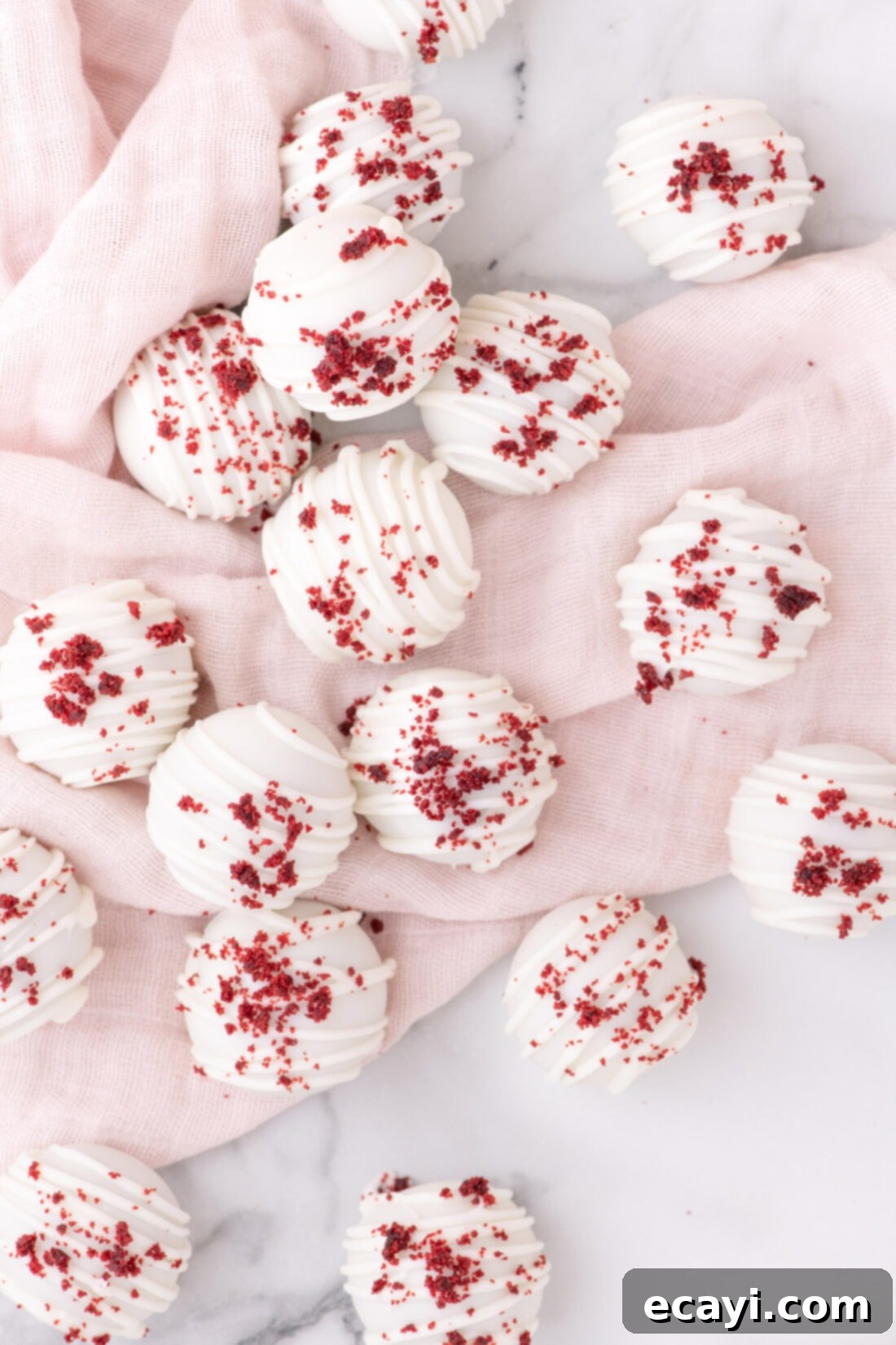 Red Velvet Truffles 15 Overhead photo of a platter filled with perfectly garnished Red Velvet Cake Balls.