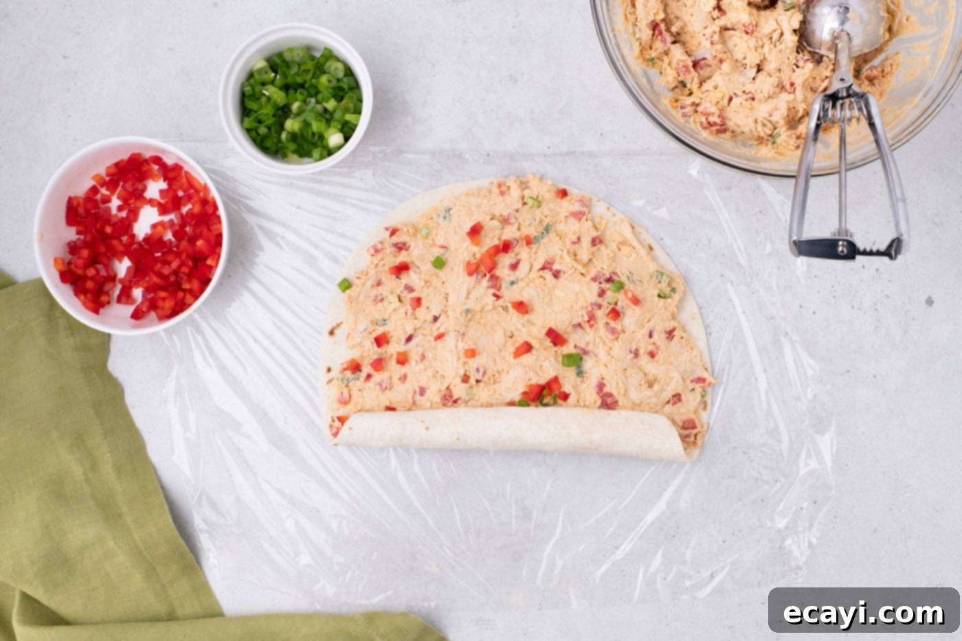 Southwest Swirls 12 rolling burrito wrap up with cream cheese and chicken mixture