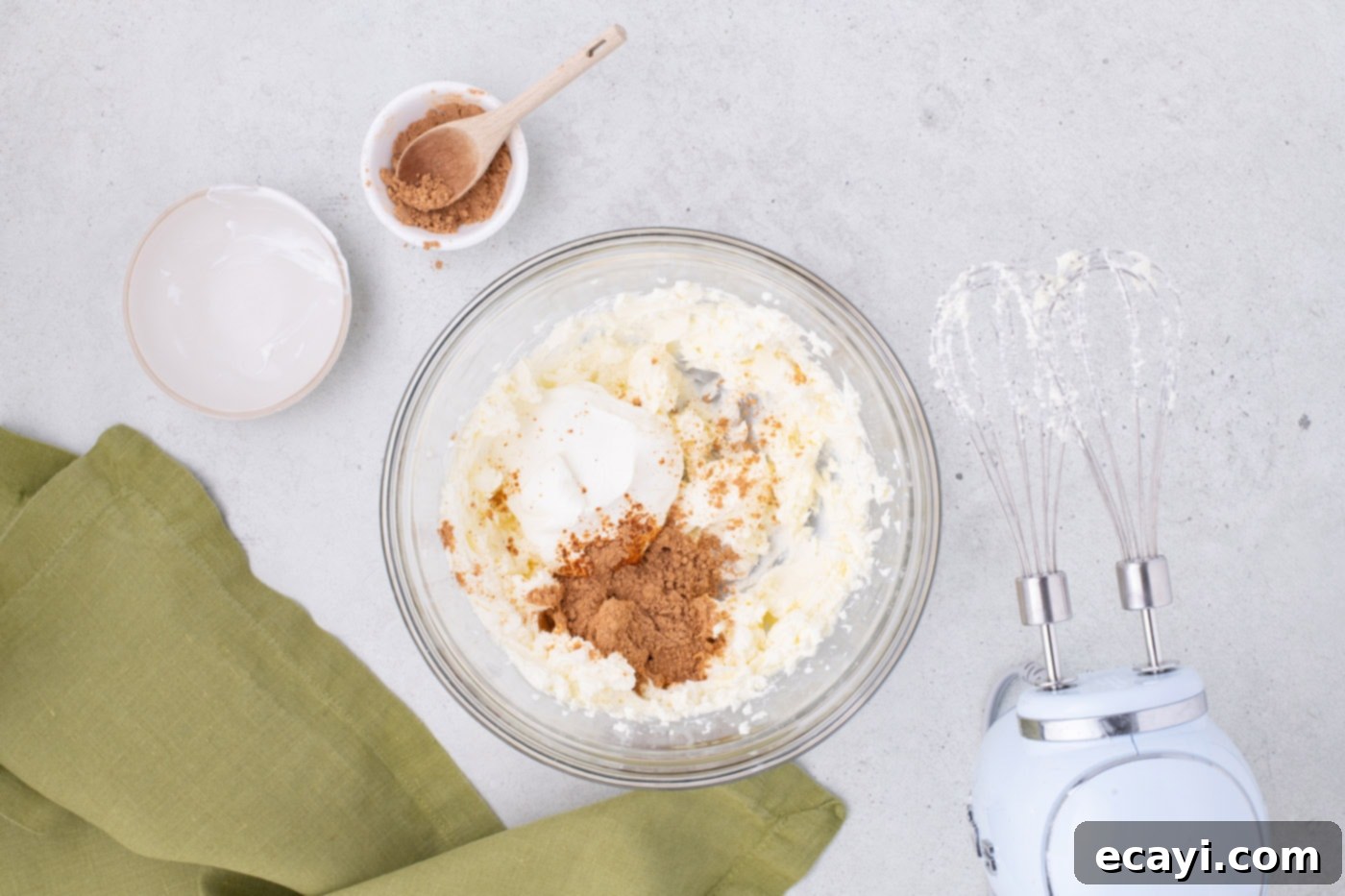 Southwest Swirls 5 sour cream, taco seasoning, and cream cheese in a mixing bowl