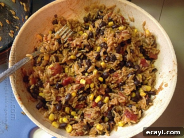 Fiesta Rice with Black Beans and Corn 8 A bowl of Spanish rice with black beans and corn.