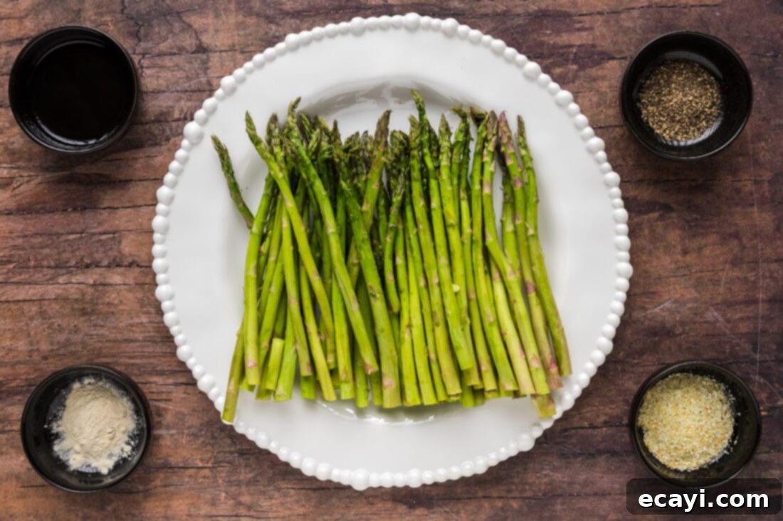 Perfectly Steamed Asparagus 4 Ingredients for Steamed Asparagus including fresh asparagus, olive oil, garlic salt, black pepper, and onion powder