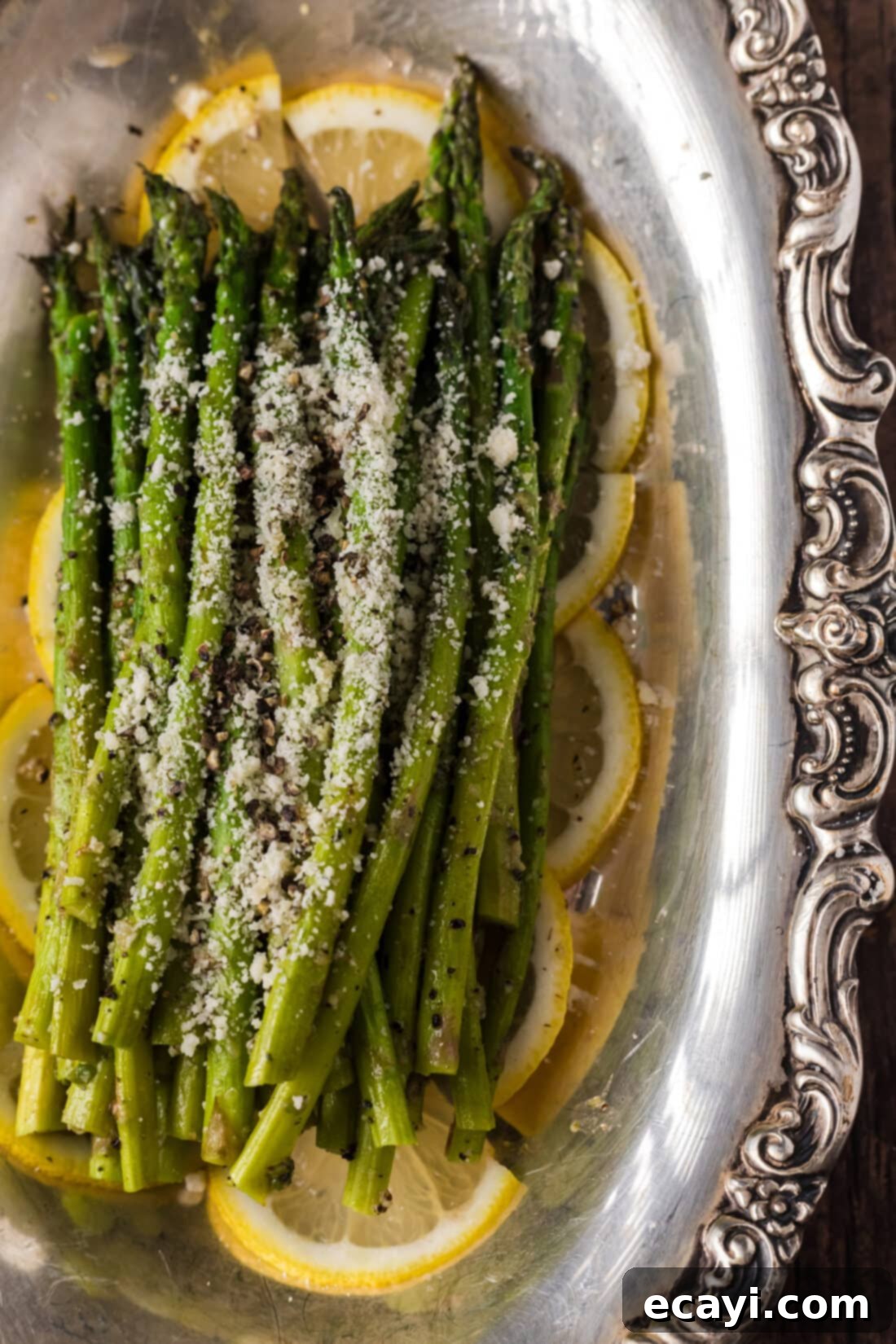 Perfectly Steamed Asparagus 9 Close up photo of Steamed Asparagus topped with parmesan cheese and lemon zest